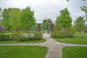 Stone Walkways towards Tennis Court and Pond - Country homes for sale and luxury real estate including horse farms and property in the Caledon and King City areas near Toronto