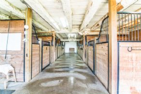 Barn Aisle - Country homes for sale and luxury real estate including horse farms and property in the Caledon and King City areas near Toronto