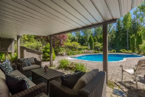 Shaded seating area by pool - Country homes for sale and luxury real estate including horse farms and property in the Caledon and King City areas near Toronto