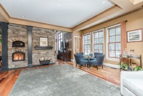Living Room with Stone Fireplace - Country homes for sale and luxury real estate including horse farms and property in the Caledon and King City areas near Toronto