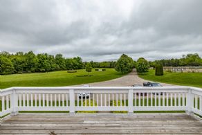 Deck Overlooking Derby Field and Outdoor Ring - Country homes for sale and luxury real estate including horse farms and property in the Caledon and King City areas near Toronto