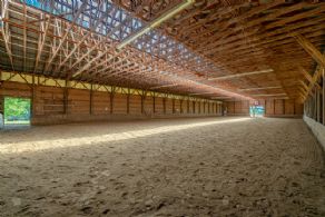 Indoor riding arena - Country homes for sale and luxury real estate including horse farms and property in the Caledon and King City areas near Toronto