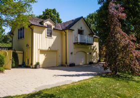 Coach House - Country homes for sale and luxury real estate including horse farms and property in the Caledon and King City areas near Toronto