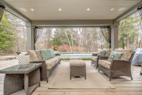 Covered porch overlooking pool - Country homes for sale and luxury real estate including horse farms and property in the Caledon and King City areas near Toronto