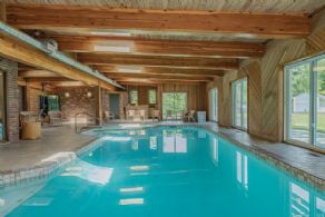 Indoor pool with hot tub, sauna, bar, exercise area - Country homes for sale and luxury real estate including horse farms and property in the Caledon and King City areas near Toronto