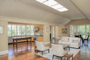 Great room with vaulted ceiling, fireplace & dining room - Country homes for sale and luxury real estate including horse farms and property in the Caledon and King City areas near Toronto