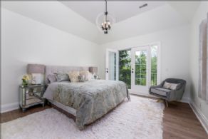 Primary bedroom with tray ceiling - Country homes for sale and luxury real estate including horse farms and property in the Caledon and King City areas near Toronto