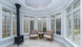 Sunroom with Fireplace - Country homes for sale and luxury real estate including horse farms and property in the Caledon and King City areas near Toronto