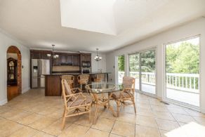 Sun-filled Kitchen with access to the North Deck - Country homes for sale and luxury real estate including horse farms and property in the Caledon and King City areas near Toronto