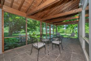 Screened porch with stone floors - Country homes for sale and luxury real estate including horse farms and property in the Caledon and King City areas near Toronto