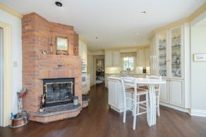 Kitchen Fireplace - Country homes for sale and luxury real estate including horse farms and property in the Caledon and King City areas near Toronto